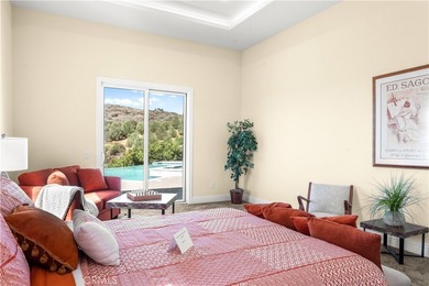 Perched high above Cross Creek Golf Course in the prestigious De