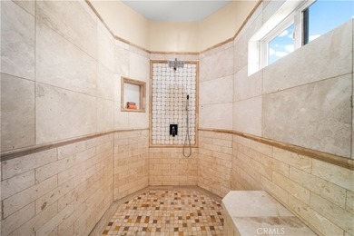 Perched high above Cross Creek Golf Course in the prestigious De