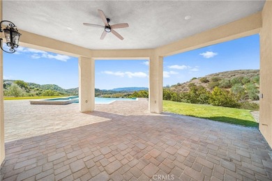 Perched high above Cross Creek Golf Course in the prestigious De