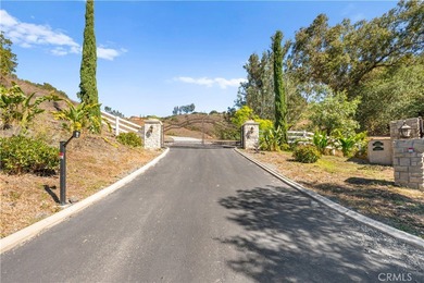 Perched high above Cross Creek Golf Course in the prestigious De