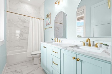 Motivated Seller! This 5 BR, 4 baths coastal home by Ben Wortman