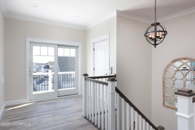 Experience the epitome of coastal living with this stunning new