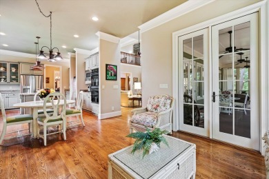 Nestled on a picturesque tree-lined street, this expansive home
