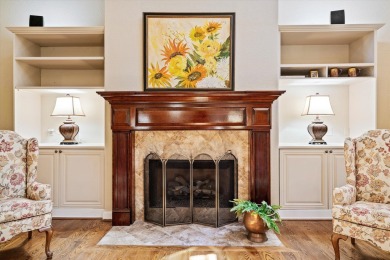 Nestled on a picturesque tree-lined street, this expansive home