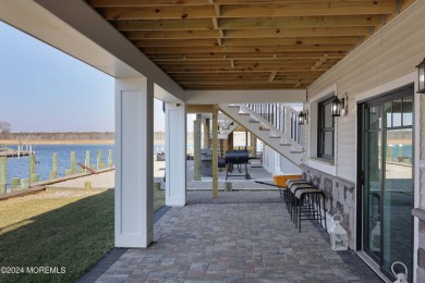 Experience the epitome of coastal living with this stunning new