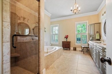 Nestled on a picturesque tree-lined street, this expansive home