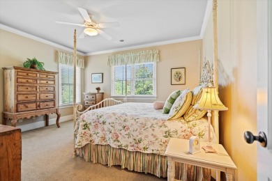 Nestled on a picturesque tree-lined street, this expansive home