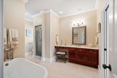 Nestled on a picturesque tree-lined street, this expansive home