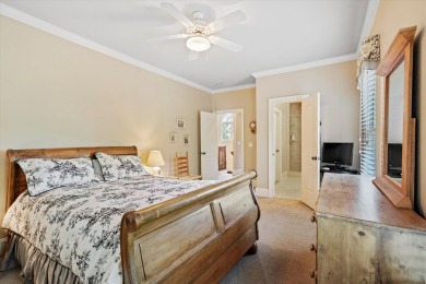 Nestled on a picturesque tree-lined street, this expansive home