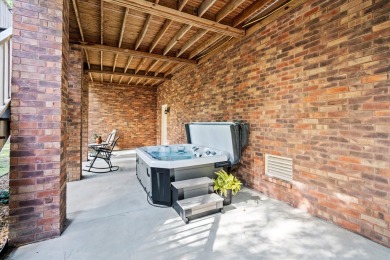 Nestled on a picturesque tree-lined street, this expansive home