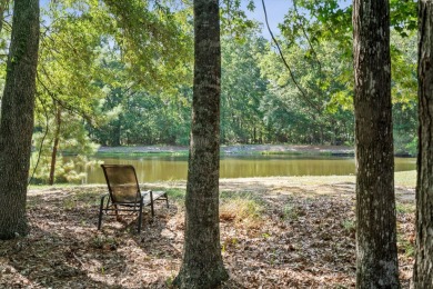 Nestled on a picturesque tree-lined street, this expansive home