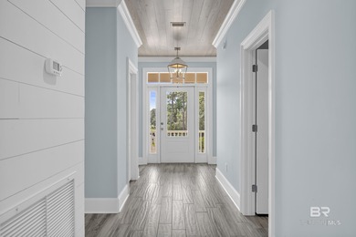 Waterfront luxury meets peace of mind just 100 yards from the