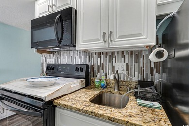 This first-floor efficiency unit, with convenient elevator