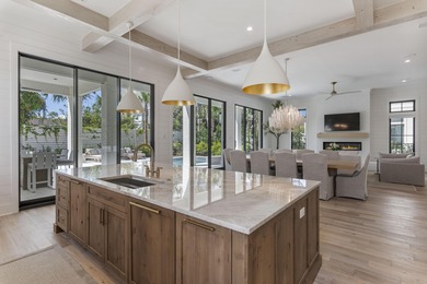 Experience refined coastal living in this newly built, fully