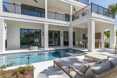 Experience refined coastal living in this newly built, fully