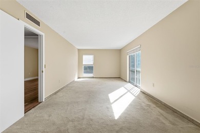 RARE 1,820 SF End Unit Condo with Stunning Golf Course Views!
