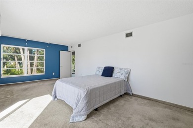 RARE 1,820 SF End Unit Condo with Stunning Golf Course Views!
