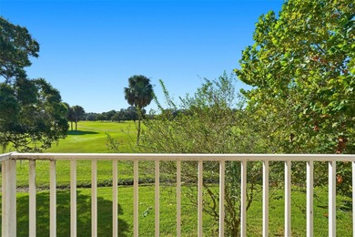 RARE 1,820 SF End Unit Condo with Stunning Golf Course Views!
