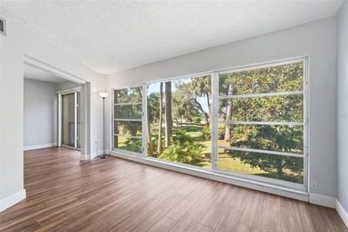 RARE 1,820 SF End Unit Condo with Stunning Golf Course Views!
