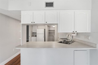 RARE 1,820 SF End Unit Condo with Stunning Golf Course Views!
