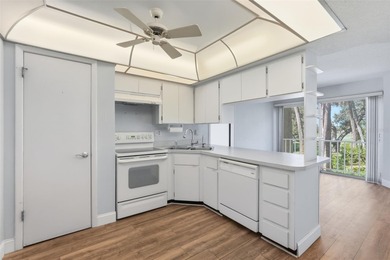 RARE 1,820 SF End Unit Condo with Stunning Golf Course Views!
