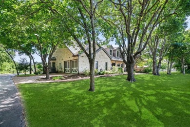 NO HOA ~ This beautifully manicured 3.06-acre property offers