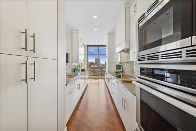 Top-floor elegance meets modern comfort in this beautifully