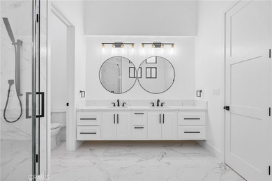 Nestled gracefully on one of the most sought-after streets in