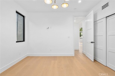 Nestled gracefully on one of the most sought-after streets in