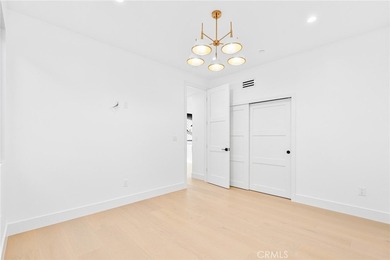 Nestled gracefully on one of the most sought-after streets in