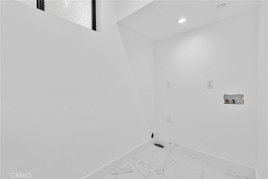 Nestled gracefully on one of the most sought-after streets in