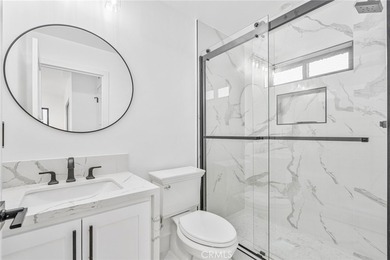 Nestled gracefully on one of the most sought-after streets in