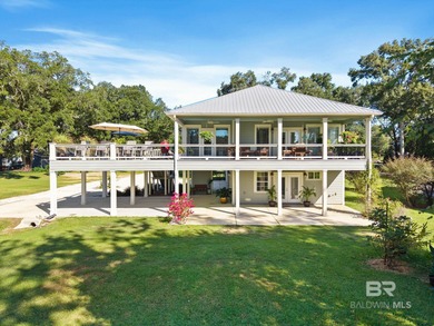 Welcome to waterfront living on Brights Creek, just off the Bon