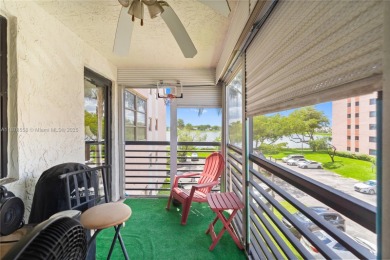 Step into luxury with this elegant condo in a quiet, gated