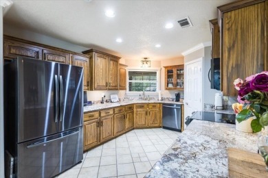 Welcome to this well maintained 3 BR and 2 bath custom built