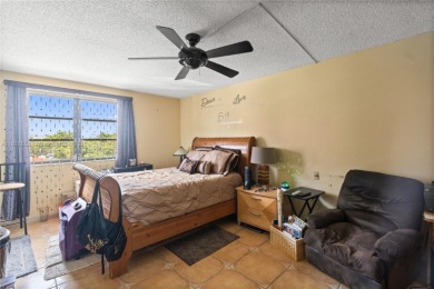 Step into luxury with this elegant condo in a quiet, gated