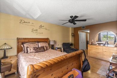 Step into luxury with this elegant condo in a quiet, gated