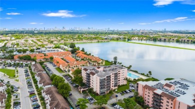 Step into luxury with this elegant condo in a quiet, gated