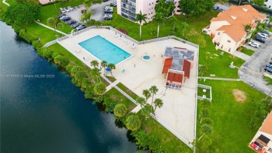 Step into luxury with this elegant condo in a quiet, gated