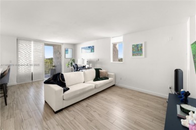 Completely remodeled 1/1 corner penthouse in the gated Nirvana