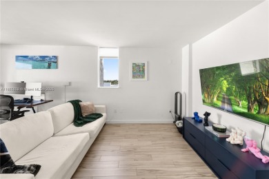 Completely remodeled 1/1 corner penthouse in the gated Nirvana