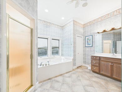 Welcome to 3890 Sand Dune Ct, a stunning 4-bedroom, 4.5-bathroom