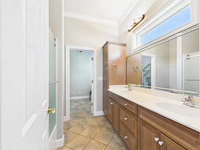 Welcome to 3890 Sand Dune Ct, a stunning 4-bedroom, 4.5-bathroom