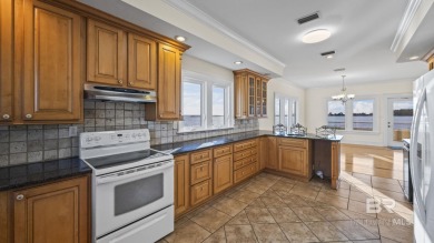 Welcome to your dream waterfront retreat! This solidly built