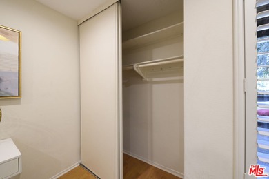 Come to see this recently refreshed townhome with the rare lake