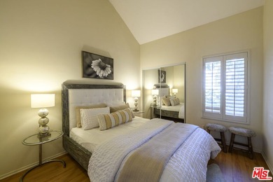 Come to see this recently refreshed townhome with the rare lake