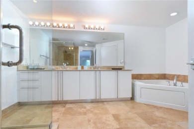 Rarely available 4-bedroom, 4-bath two-story condo with soaring