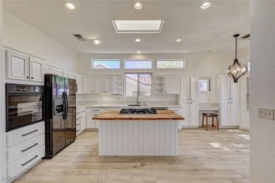 Explore this immaculately updated townhome in Sun City Summerlin