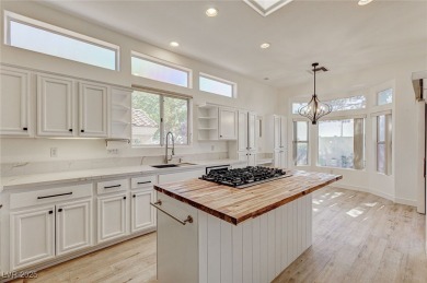 Explore this immaculately updated townhome in Sun City Summerlin