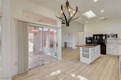 Explore this immaculately updated townhome in Sun City Summerlin